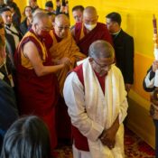 Governor of Sikkim H.E. Lakshman Prasad Achararya and Sikkim Chief Minister Shri Prem Singh Tamang leading the way as His Holiness the Dalai Lama arrives for the teaching requested by the Government of Sikkim at Paljor Stadium in Gangtok, Sikkim, India on December 12, 2023. Photo by Tenzin Choejor