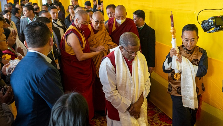 Governor of Sikkim H.E. Lakshman Prasad Achararya and Sikkim Chief Minister Shri Prem Singh Tamang leading the way as His Holiness the Dalai Lama arrives for the teaching requested by the Government of Sikkim at Paljor Stadium in Gangtok, Sikkim, India on December 12, 2023. Photo by Tenzin Choejor